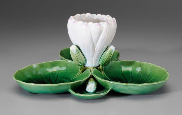 Mintons Majolica Stand: British, late 19th century, three connected bowls shaped as water lily leaves interspersed with buds surrounding open water lily, impressed "Mintons" and "1174", possibly an ices (frozen dessert) stan