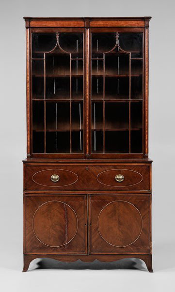 Hepplewhite Inlaid Secretary/Bookcase: British, 19th century, mahogany, fruitwood inlaid removable cornice over two glazed doors with fruitwood pilasters, carved muntins, adjustable shelved interior, lower case with fitted secretary drawer