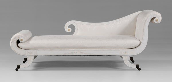 Regency Style [Recamier]: 20th century, white-painted frame with floral decoration and applied rosettes, white damask upholstery, 32 x 81 x 27-1/2 in., frame repainted and with minor abrasions, wear and stains to upholstery Pr