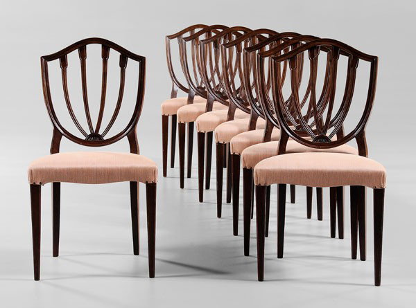 Eight Hepplewhite Style Dining Chairs: 20th century, in mixed woods, each with shield back and tapered square legs, pink-upholstered seats, 35-3/4 x 19-1/2 x 21-1/2 in., generally good condition with surface wear and abrasions, stains and 