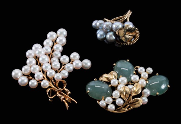 Three Pieces Pearl Jewelry: floral brooch with light green jade and Okoya cultured pearl accents, 1-1/2 x 2-1/8 in.; Mikimoto Akoya cultured pearl branch-form brooch, 2-1/8 x 2-1/2 in.; grape-form ring with gray cultured pearls,