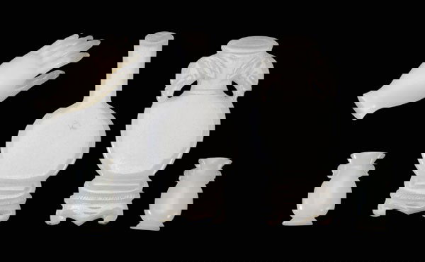 Five Pieces Hardstone: Chinese, 19th century, all white stone: one hand finely carved with open palm, detailed fingernails, lines, top of hand with yellowish opaque area, 1-5/8 in.; four vase forms with flat backs, probably