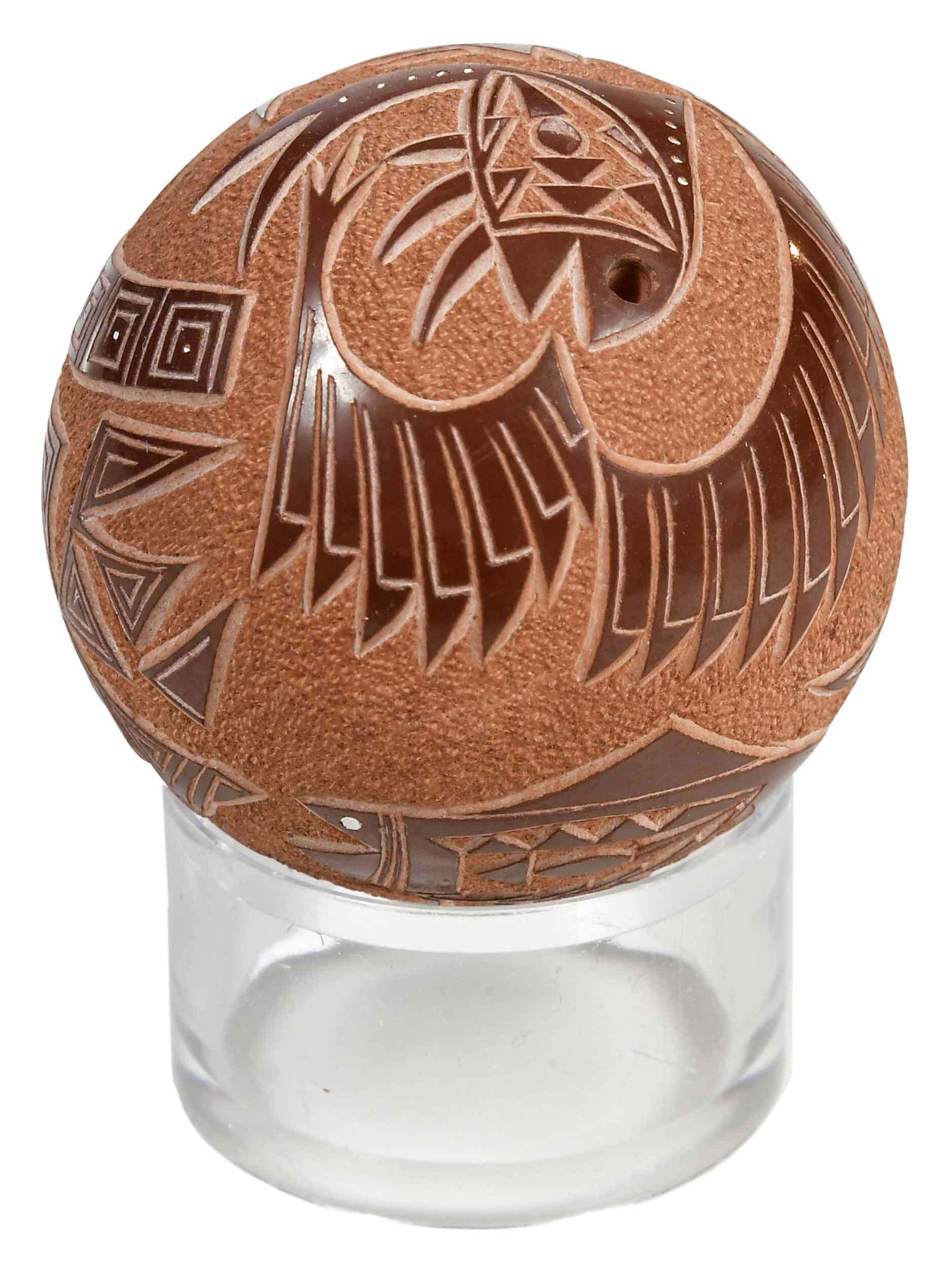 Art Cody Huangooah Carved Seed Pot: signed on base inside fish motif "Huan-gooah", (Art Cody Huangooah, Kiowa/Santa Clara, 1943-1985), with bas relief geometric and fish decoration, 2 in.; on acrylic base Provenance: Private Florida Col