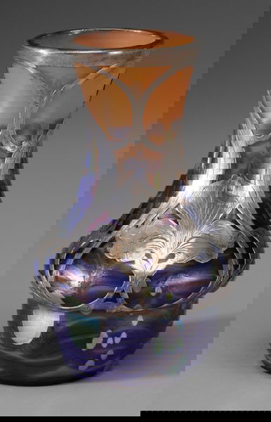 Silver Overlay Art Glass Vase: early 20th century, iris style silver overlay over varying amber and oil-spotted blue body, silver with marks for Alvin, possibly Loetz, 6 in., normal base wear, excellent condition Provenance: North