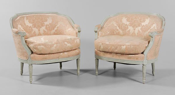 Pair Louis XVI Style Bergeres: French, early 20th century, each with carved and pale blue painted beechwood frames, pink silk damask upholstery with down cushions, 33 x 37 x 27 in., frames repainted and with scattered surface wear,