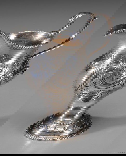 George III Silver Cream Pitcher: London, 1768, pyriform with gadroon borders, "S" handle, floral and scroll decoration, probably George Smith III, no monogram, .925 fine, 3.67 oz.T., 4-1/4 x 4-1/2 x 2-1/2 in., base repair and pushed