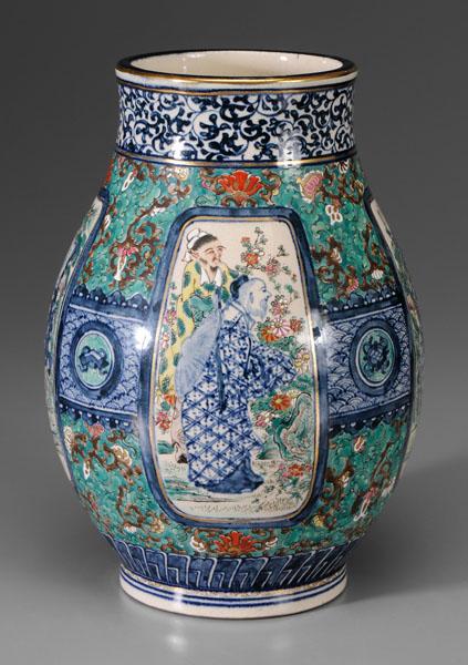 [Hu] Chinese Earthenware Vase: 20th century, underglaze blue and enameled decoration, cartouches with scholars in gardens on a flowering vine green ground, base with two blue concentric circles, 12-1/4 in., drilled base with 1-1/2