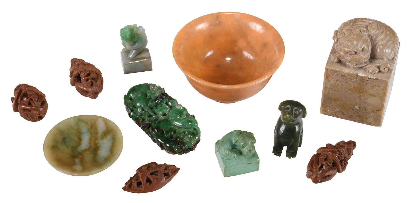 Group of 11 Asian Miniature Decorative Objects: comprising: four Japanese carved nuts, three depicting monkeys and infants, one depicting a boat with people, largest 1-7/8 in.; three carved hardstone seals, dog, monkey, and foo dog finials, largest