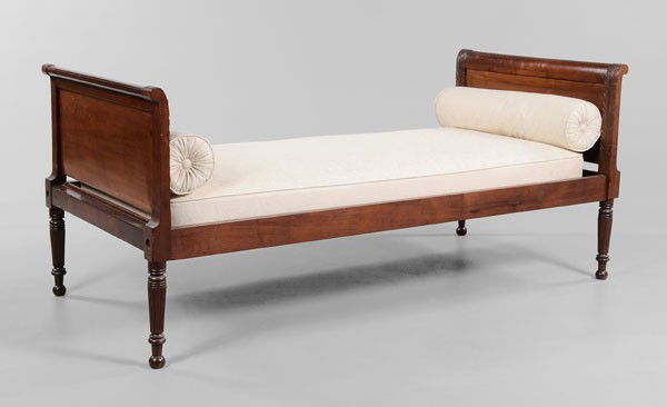 Duncan Phyfe Carved Mahogany Daybed: New York, Phyfe or a Contemporary, early 19th century, poplar(?) secondary, 76-1/2 x 33 x 36 in., minor cracks, surface wear and stains consistent with age and use, scattered veneer repairs to rails.