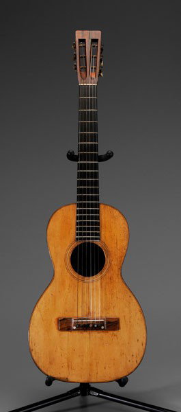 Vintage Martin Guitar: American, late 19th century, spruce and rosewood with band of herringbone inlay on back, cedar neck, ice cream cone volute, open peg board, engraved tuner plates, 18 frets, stamped on back of headstoc