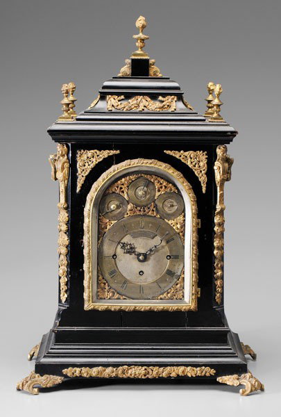Chippendale Style Musical Bracket: Clock, American or English, retailed in Philadelphia, late 19th century, ebonized wood with gilt bronze mounts, silvered brass dials with chime silent, fast/slow adjustment and chime change indicators