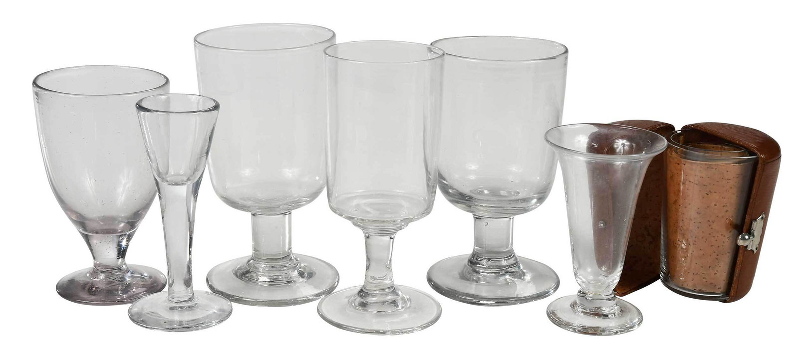 21 Pieces Georgian Glass Stemware, Three Shot Glasses: British, 18th/early 19th century, including wine glasses, cordials, and rummers, most of cylindrical form with flat circular bases, 4 in. to 6 in.; together with three shot glasses in leather and trav