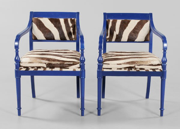 Pair Regency Style Open-Arm Chairs: 20th century, each with bright blue painted frame and zebra skin upholstery, 33 x 23 x 20 in., good condition with light surface wear and abrasions, some wear and losses to upholstery Provenance: Form