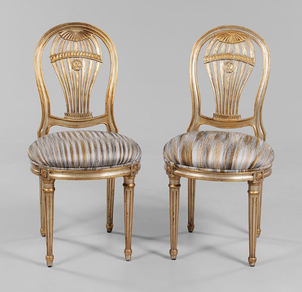 Pair Louis XVI Style Side Chairs: modern construction by Theodore Alexander, gilt and silvered frames and upholstered seats, 37-1/2 x 19 x 22 in., good condition with scattered surface wear and distress (some as made) Provenance: Priv