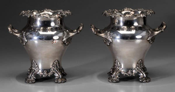 Pair Old Sheffield Plate Coolers: English, mid 19th century, urn form with acanthus and shell feet, grape and vine borders, marks for J. Dixon & Sons, let-in shield with heraldic device, 10-1/4 x 11 x 8 in., lacking inserts, loss to p