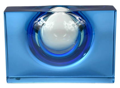 Tom Patti Glass Sculpture: (New York/Massachusetts, born 1943)Convex Horizontal Blue (TP 69), 1987, signed on edge "Patti 1987", laminated, fused, blown, and hand polished glass, 4-1/2 x 6-1/4 x 3-3/8 in.Note: Trained as an