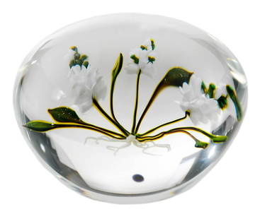 Paul J. Stankard Botanical Glass Paperweight: American, 20th century, paperweight encasing lampworked botanically lifelike flower, three spires of small clustered white blooms, leaves, and roots, cane signature "S", 2-3/4 in. diameterProvenance: