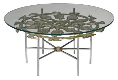 Donald Drumm Cast Aluminum Table: 20th century, chromed base with six legs and stretchers terminating into a circular hub, the top supports a cast aluminum sunburst design with amorphous shapes, green coloring, glass top, 15 x 30 in.