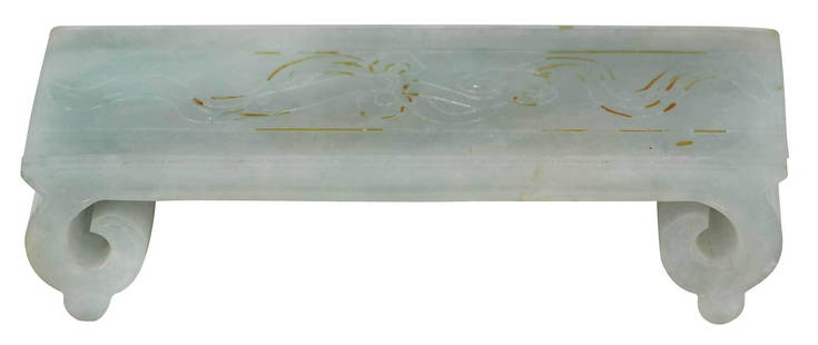 Chinese Jade or Hardstone Scholar's Brush Stand: pale green in color with one area of light brown inclusion, rectangular form with two scrolling supports, top decorated with carved ruyi scepter and flowing ribbon, accession number "67.23.5" (accessi