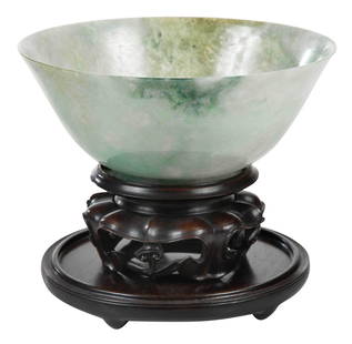 Chinese Jade or Hardstone Bowl: richly mottled in semi-translucent primarily of white color with green and some emerald tones and inclusions, plain design with everted rim and ring foot, accession number in red reads "64 2.3a"