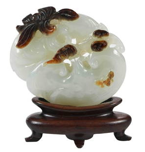 Chinese White Jade or Hardstone Fruit Cluster Ornament: white in color with dark brown inclusions expertly carved as accent sections, cluster of fruit with brown leaf, butterfly and bats, accession number "64.22.1" (accessioned 1964), 2 x 2-1/8 in.; with