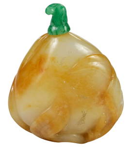 Chinese Jade or Hardstone Snuff Bottle Peach Form: whitish color with inclusions of yellow and brown, trailing leafy vines, green stem form stopper, accession number "67.23.2" on base, 2-1/2 x 2 in. Provenance: Charles M. Blackmon Collection, South Ca