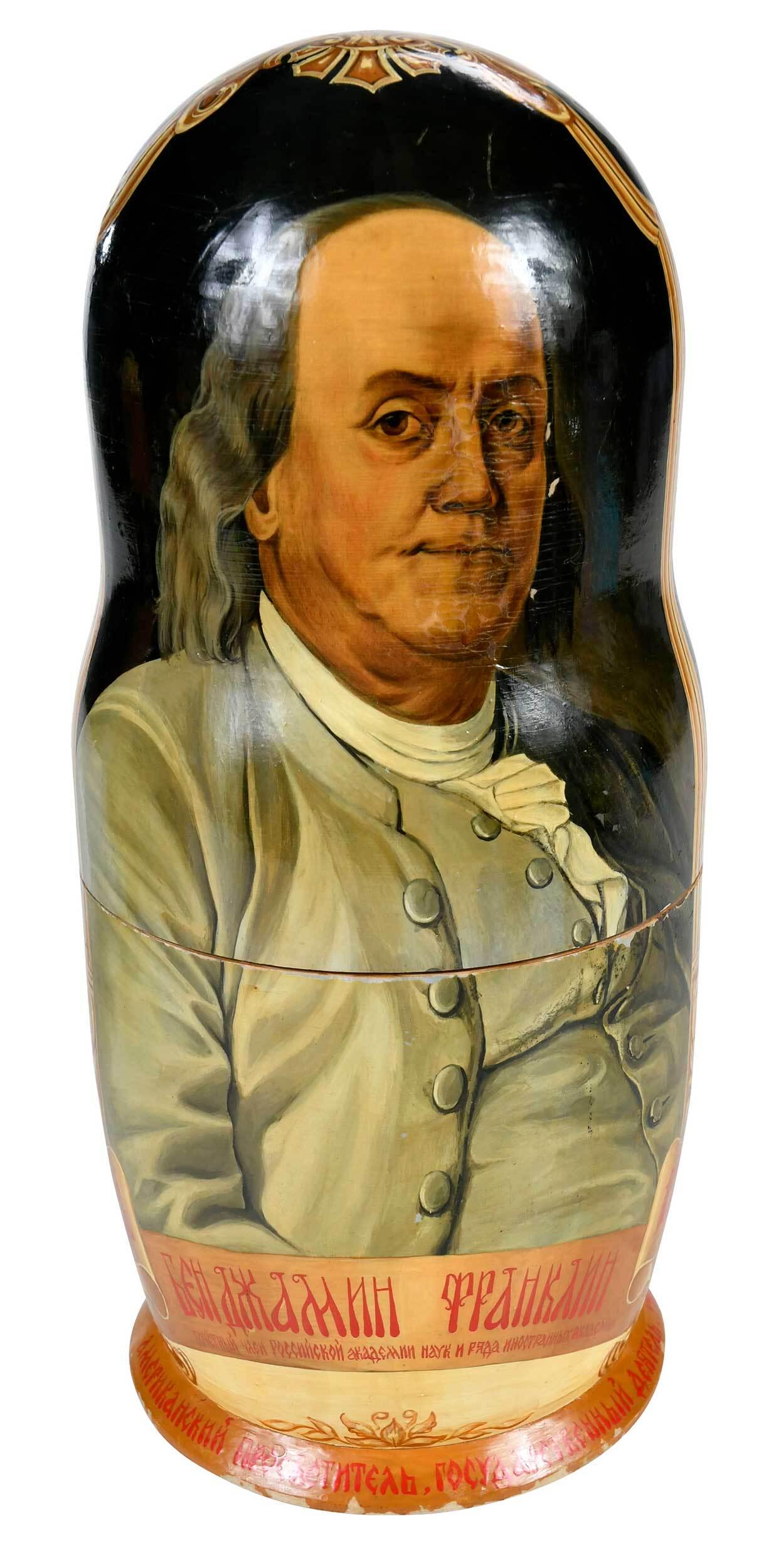 10 Piece Benjamin Franklin Russian Nesting Doll Set: early 20th century, painted with portrait and scenes from the life of Benjamin Franklin, text in Cyrillic, 12 in. to 1-3/4 in.