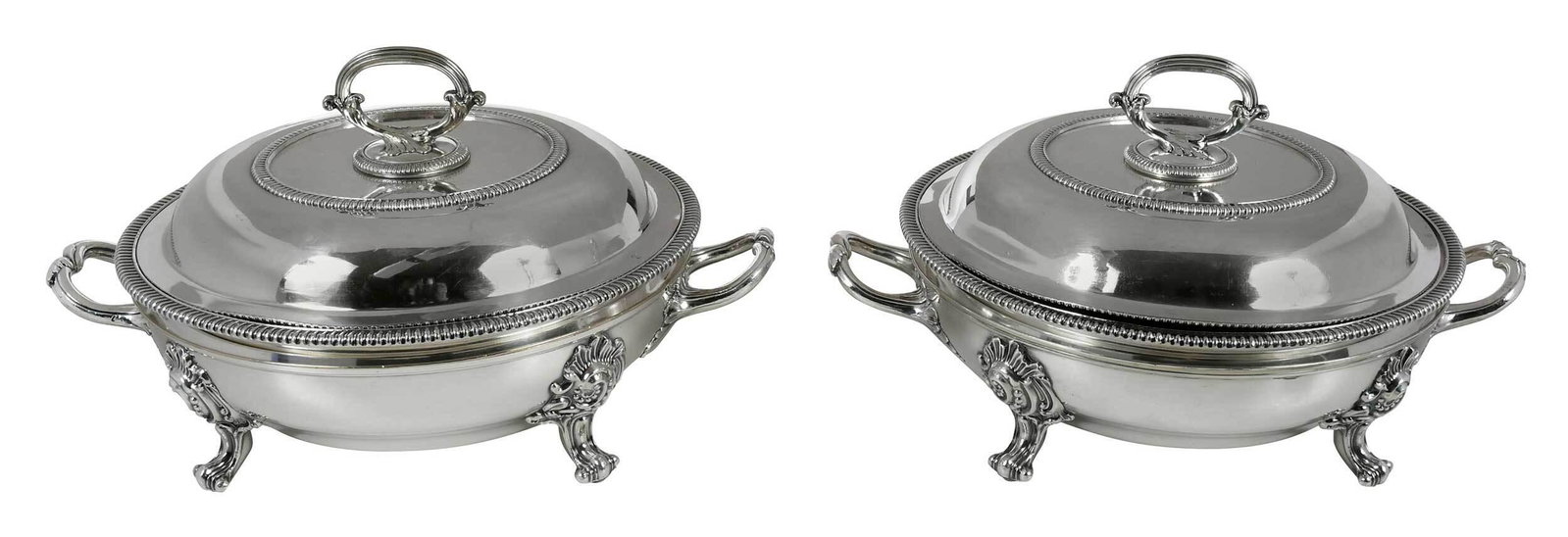 Pair of Old Sheffield Plate Entrees: English, early 19th century, round with gadroon borders, scroll feet, no monograms, unmarked, 6-3/4 x 12-1/4 x 9-3/4 in. Provenance: Private Virginia Collection