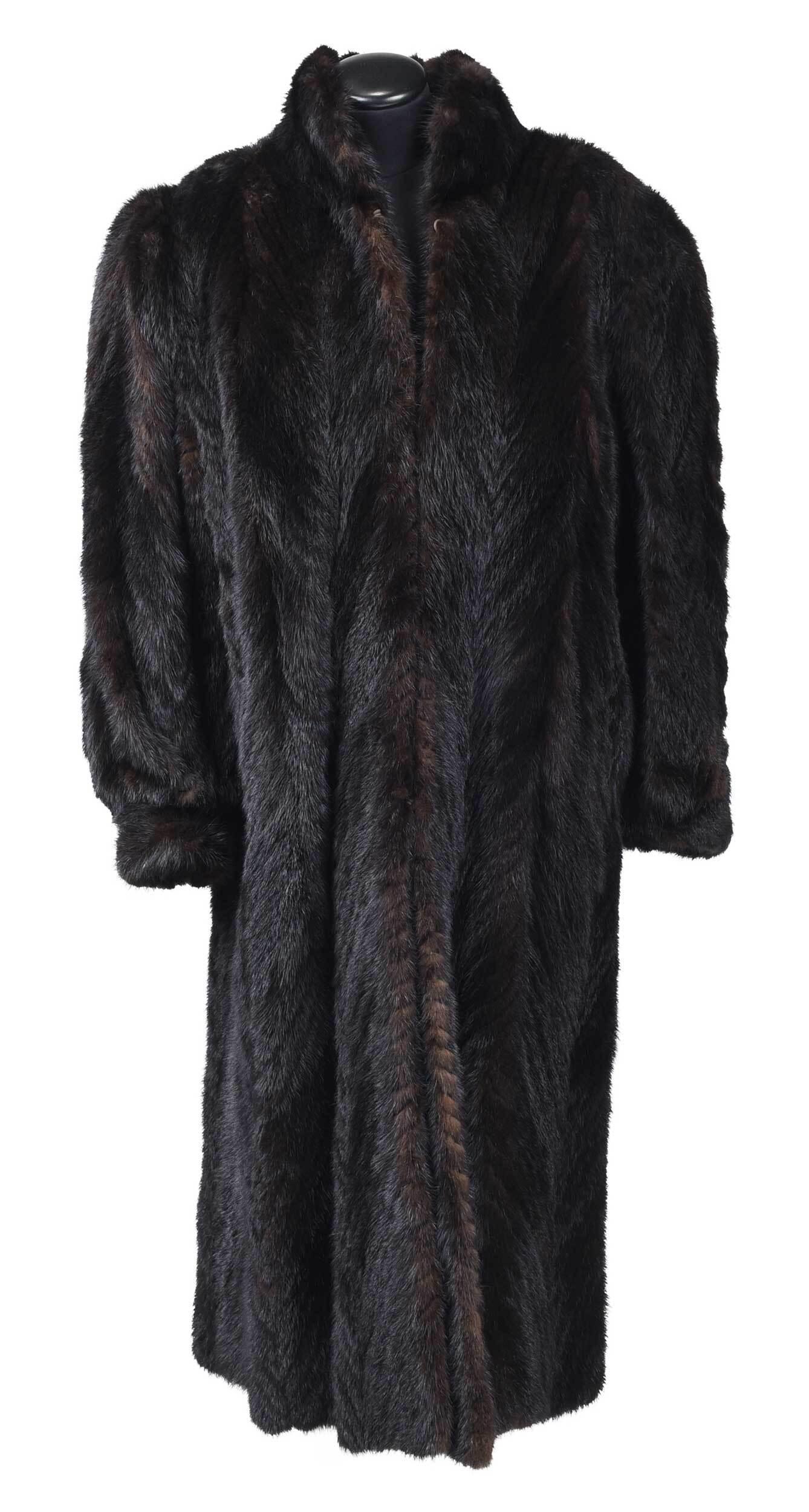 Full Length Mink Fur Coat: hook and eyelet closure, interior brown lining, cuffed, shoulder 19-1/2 in. length 48 in. Provenance: Virginia Collection