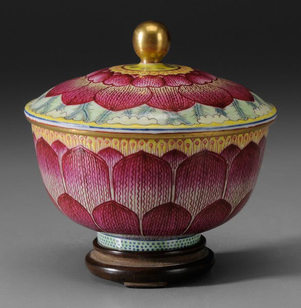 [Famille Rose] Lidded Porcelain Bowl: Chinese, possibly Daoguang period (1821-1850), lid with round gilt finial rising from the center of a lotus flower resting on a lotus leaf, bowl with rows of lotus petals, base with blue Qianlong seal