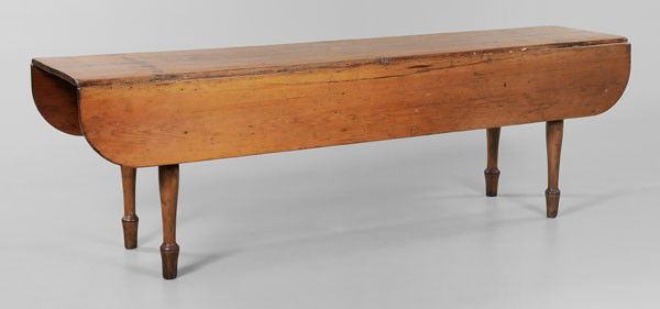 Pine Drop-Leaf Harvest Table: American, possibly Shaker, 19th century, pine throughout with turned birch legs, 28-1/4 x 90 x 42 in., refinished, patches, repairs and surface abrasions to top, some repairs at joint of legs to skirt