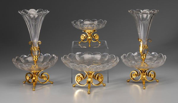 Gilt Bronze, Glass Centerpiece: probably Continental, late 19th/early 20th century: two epergnes, tripod bases with floral elements, each with removable trumpet-shaped vase, above scalloped crystal bowl, 16 in.; with two matching bo