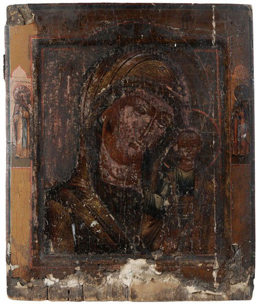 Russian Icon: (late 18th/early 19th century), Virgin of Kazan, tempera on convex panel, 16-5/8 x 14-1/4 in., losses to lower half, panel split, darkened varnish, two splines verso (one missing), loss upper left cor
