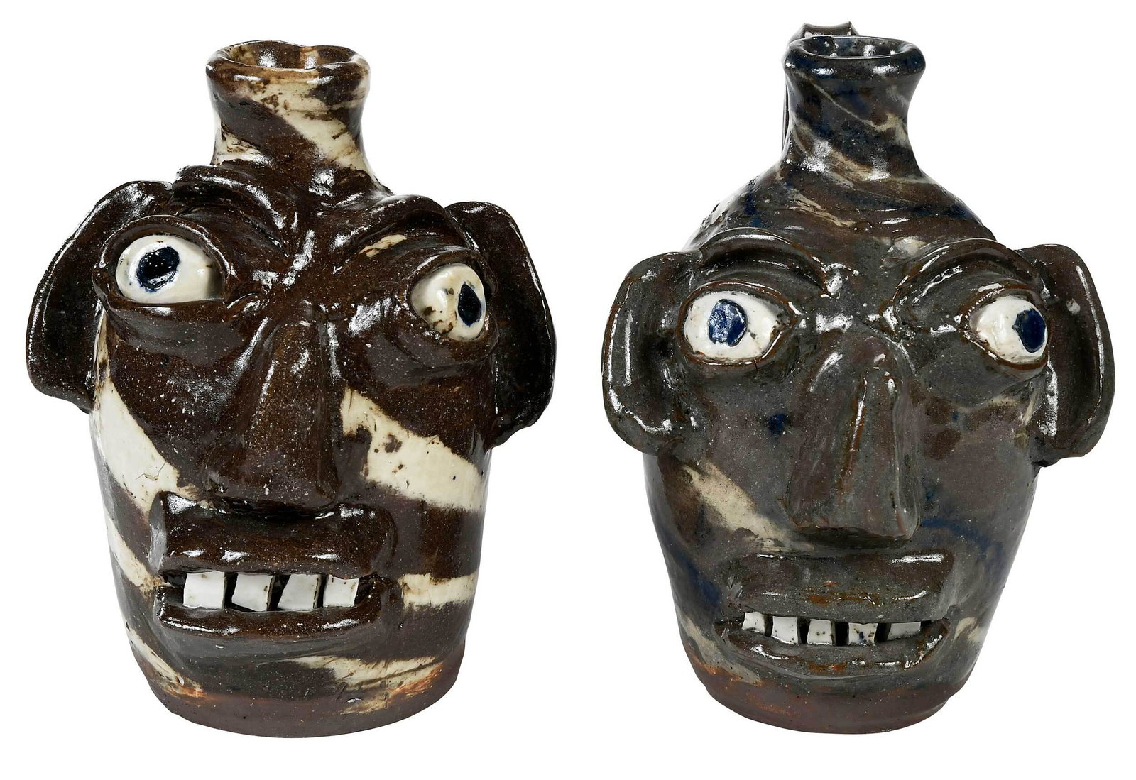 Two Burlon Craig Swirl Face Jugs: (Vale, North Carolina, 1914-2002) brown and cream swirl face jug, blue, white and tan swirl face jug, both with applied facial features, inset kaolin eyes with cobalt pupils, broken china teeth, line 