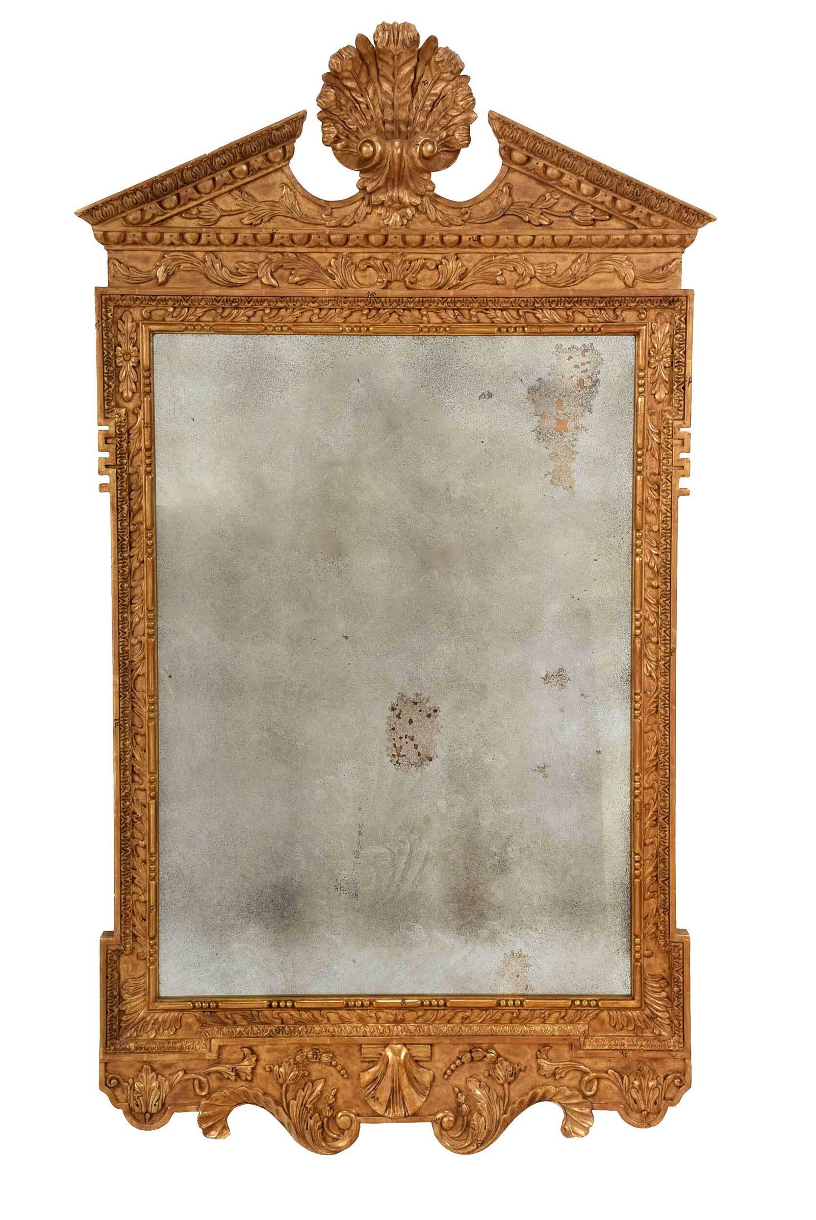 Pair George II Style Carved Giltwood Mirrors: late 20th century, each with well carved pitch pediment centering a large shell ornament, distressed mirror plates, 56 x 31 in. Provenance: Private Collection, Brookline, Massachusetts