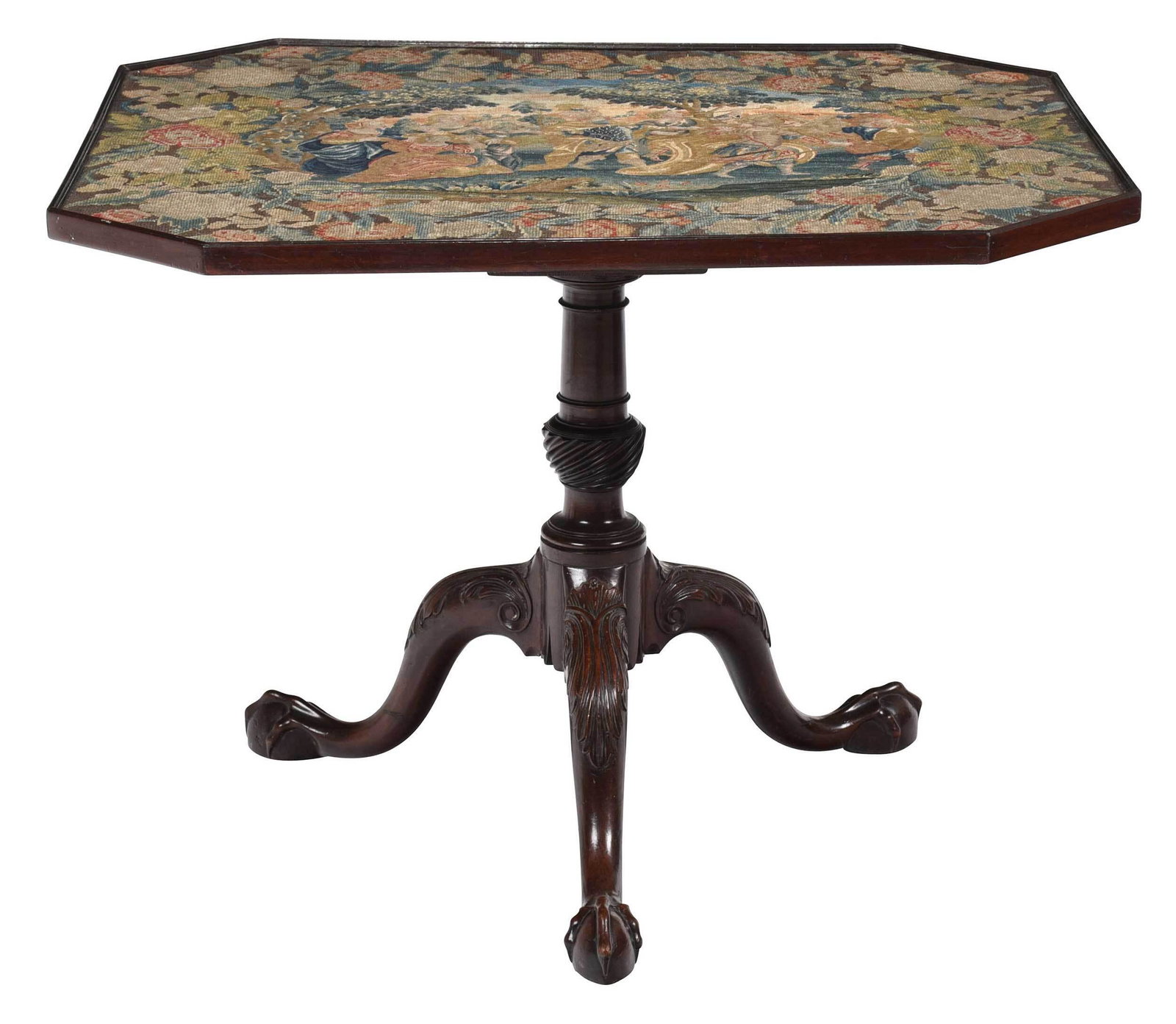 Fine George II Carved Mahogany and Needlepoint Table: British, mid 18th century, tilt top with fine needlework and petit point upholstery centering a processional scene, rotating birdcage support, carved tripod base with ball and claw feet, set with orig