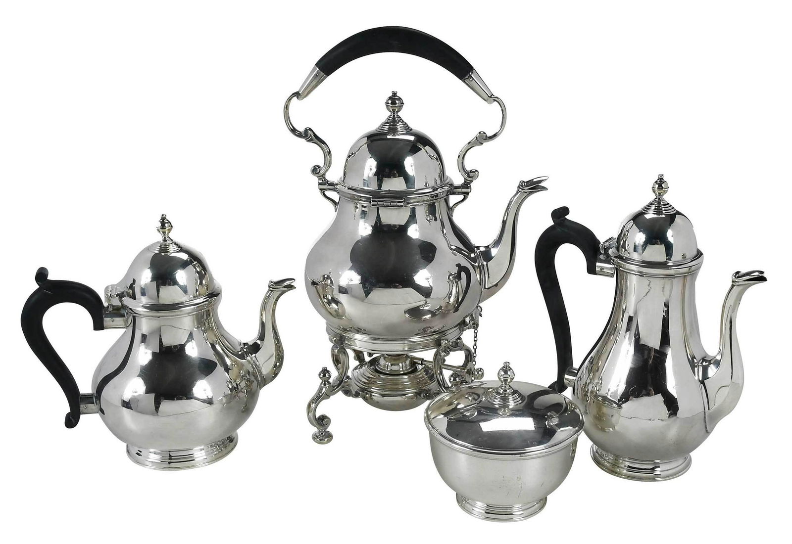 Four Piece English Silver Tea Set: Birmingham, 1937, pear forms, wooden handles, marks for Ellis & Co., .925 fine, 109.62 oz. T. gross weight, 13 in. hot water urn with matching coffeepot, teapot, and covered sugar Provenance: Property