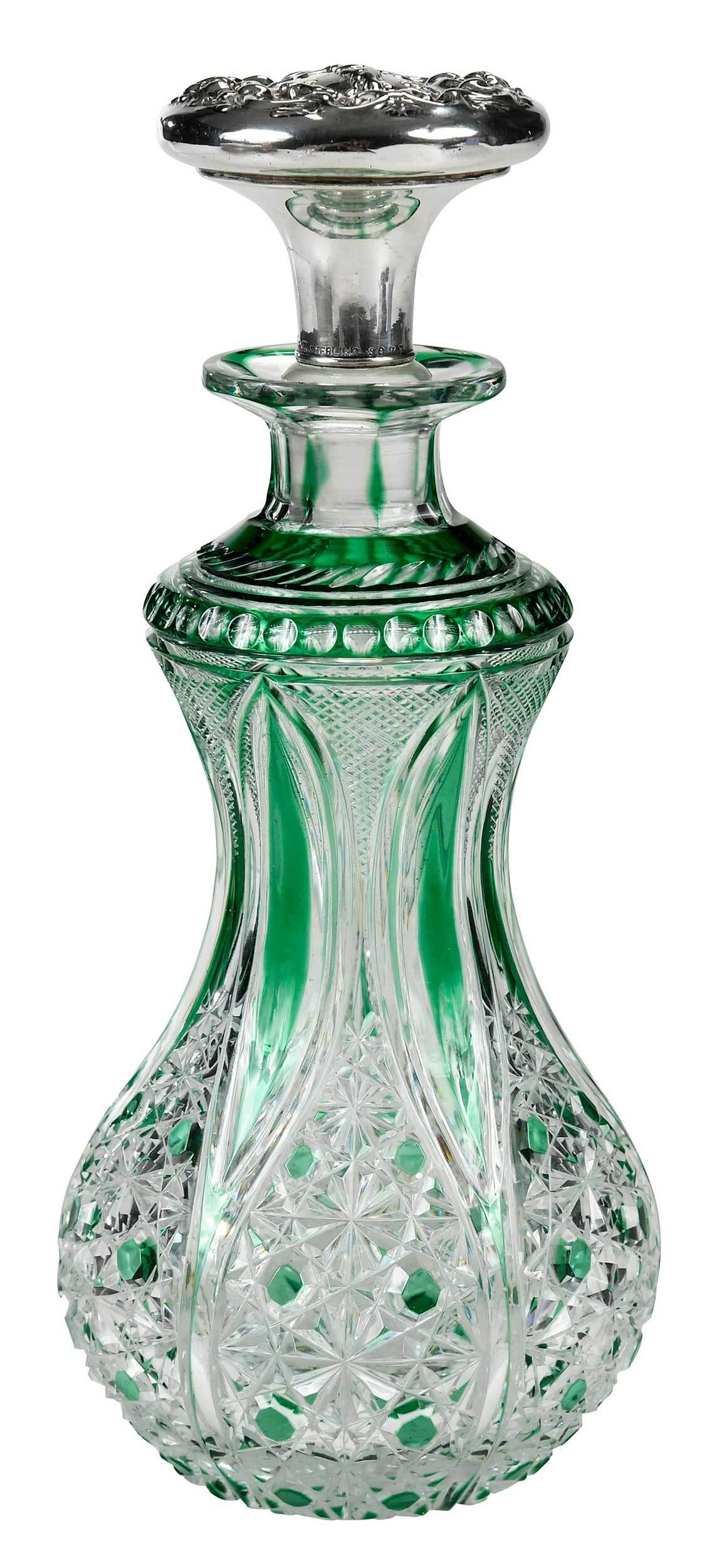 French Emerald Cut to Clear Glass Perfume Bottle: early 20th century, possibly Baccarat, cut in Russian pattern with vesicas and fine diamonds, associated Wallace Irian sterling stopper, Venus with putti decoration, marks for Wallace, "3073", 8-1/4 i