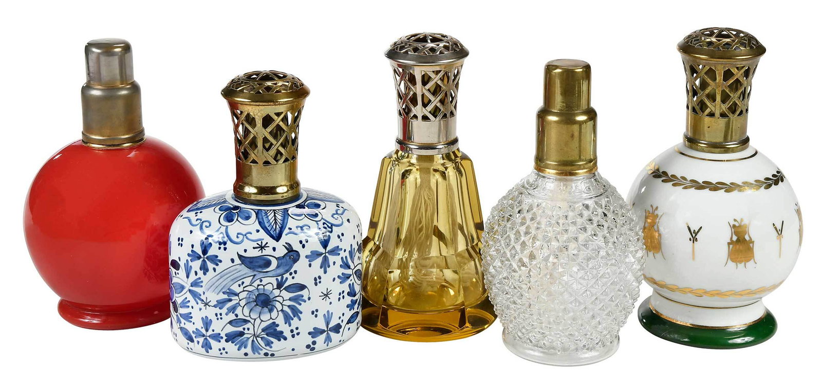 Five French Perfume Burner Diffusers: 20th century, comprising: Lampe Berger of spherical form, gilt insect decoration, green circular foot, wick and burner, pierced brass cap, marked "Lampe Berger" and "Made in France", base stamped "Ber