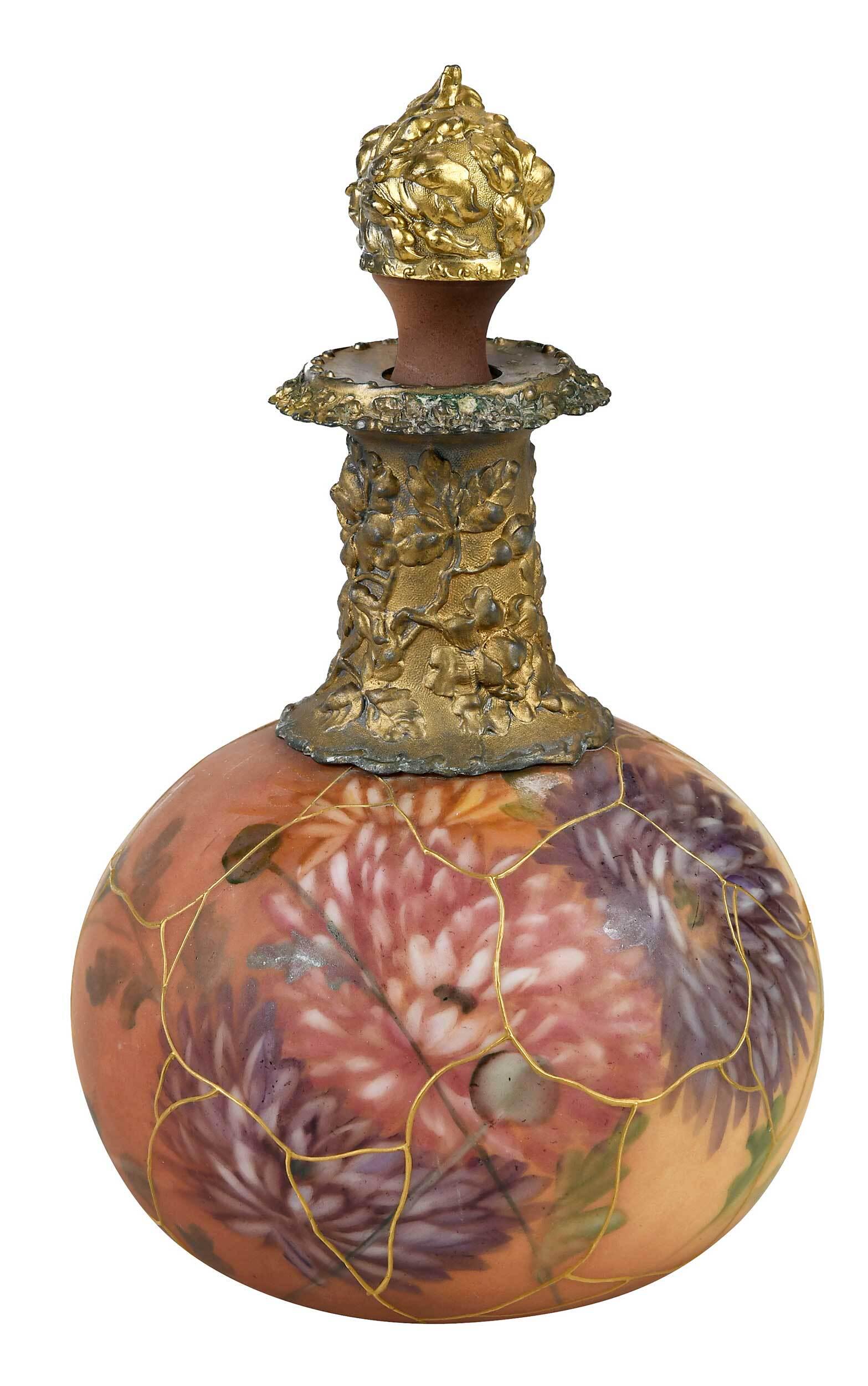 Mt. Washington Painted and Gilt Glass Cologne Bottle: New Bedford, Massachusetts, circa 1890s, Mt. Washington & Pairpoint, marked "2300/1214" on base, cologne bottle of bulbous form, hand painted with decoration of mums, with raised gilt segmented lines 