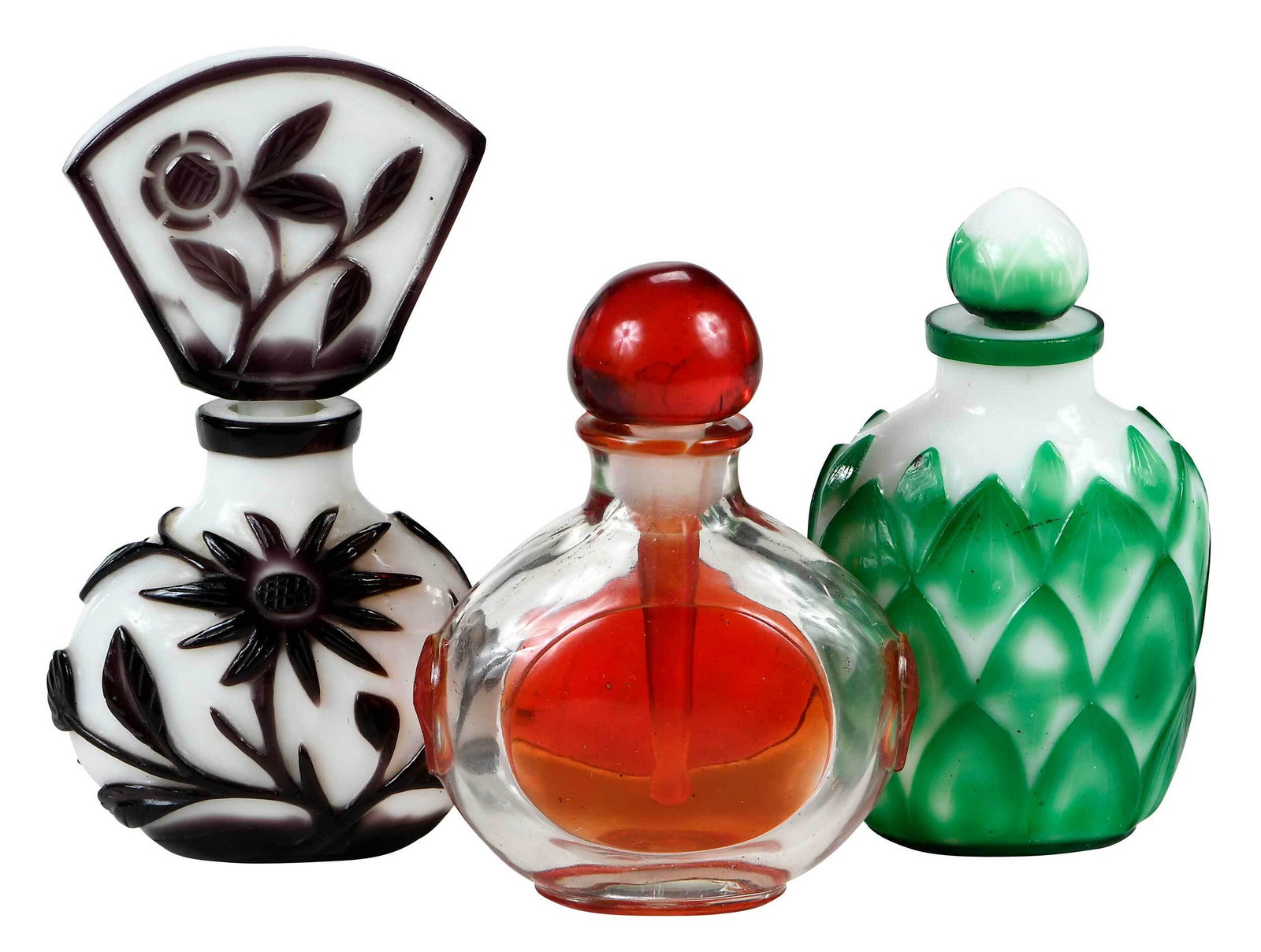 Three Chinese Peking Glass Perfume Bottles: 20th century, of various cuts and colors, each marked to base "China", tallest 4-3/4 in. Provenance: Collection of Janice and Joe Boyd