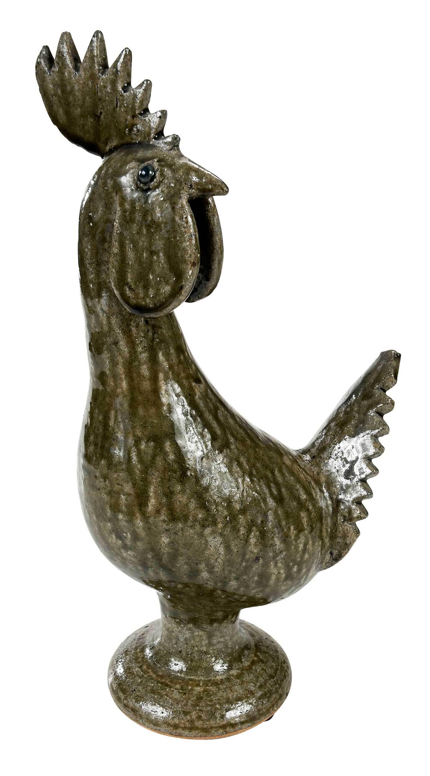 Edwin Meaders Stoneware Rooster: (White County, Georgia, 1921-2015) runny green alkaline glaze, applied tail, comb and wattles, inscribed on base "Edwin Meaders", 15-1/2 in. Provenance: Private North Carolina Collection