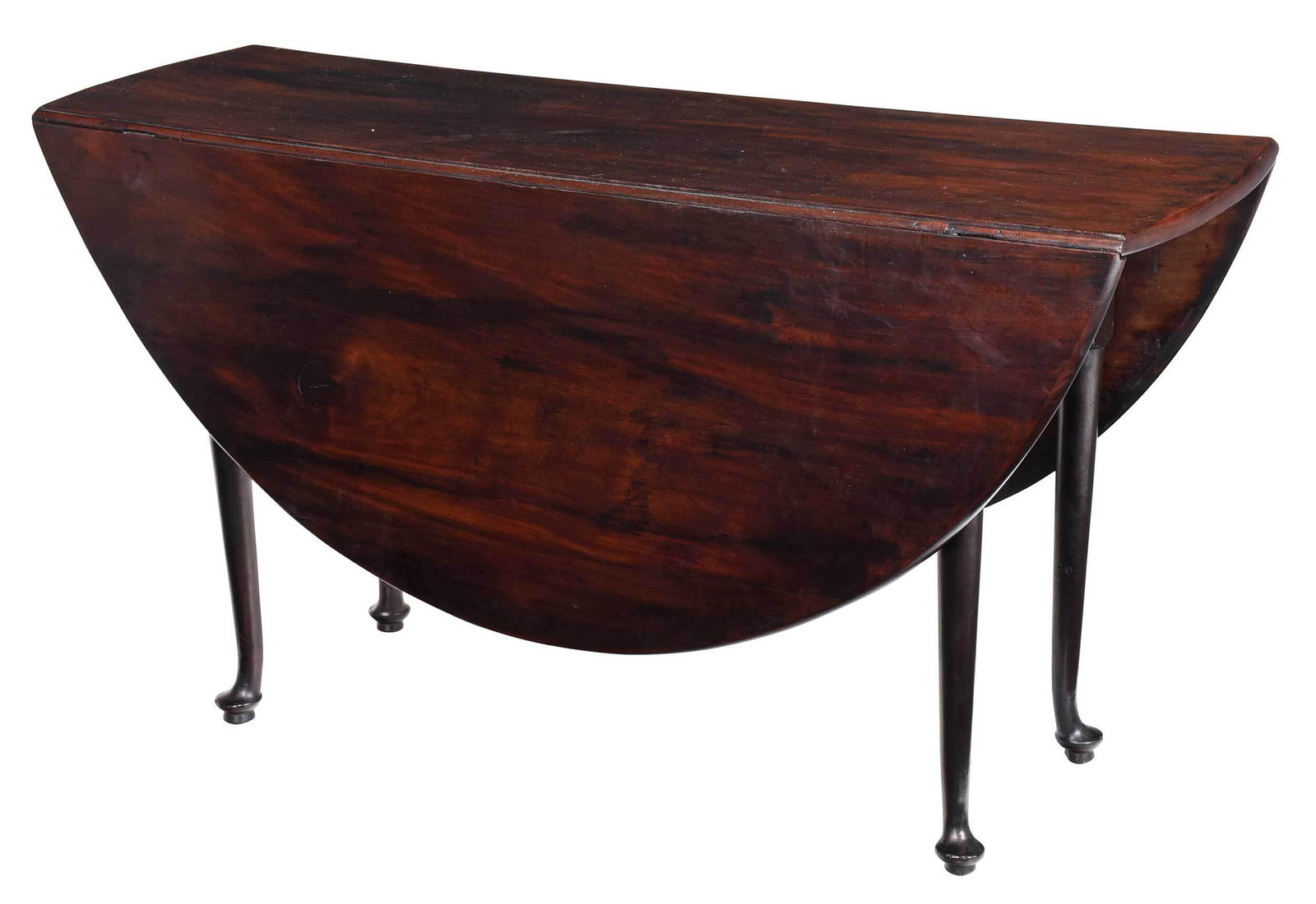 Rare Virginia Queen Anne Mahogany Drop Leaf Table: Southeast Virginia, possibly Surry County, mid 18th century, figured dense mahogany throughout, yellow pine secondary, turned legs with pad feet raised on turned risers, rosehead nail construction, 28