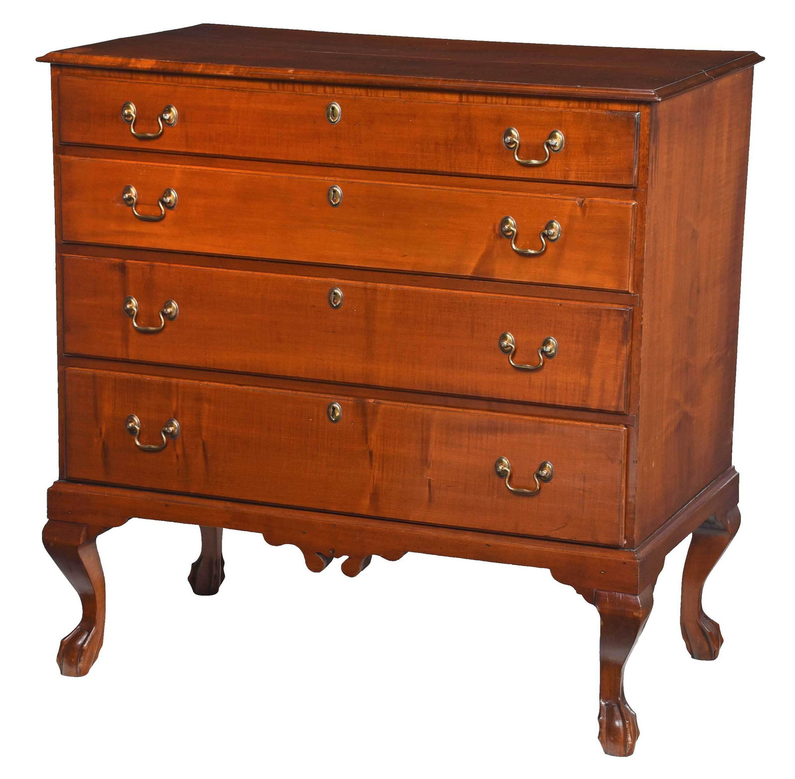 Rare and Unusual New England Chippendale Maple Chest: New Hampshire or Connecticut, probably late 18th century, with four graduated dovetailed drawers, figured maple with cherry colored stain, scrolled skirt drop and tall cabriole legs with egg and claw 