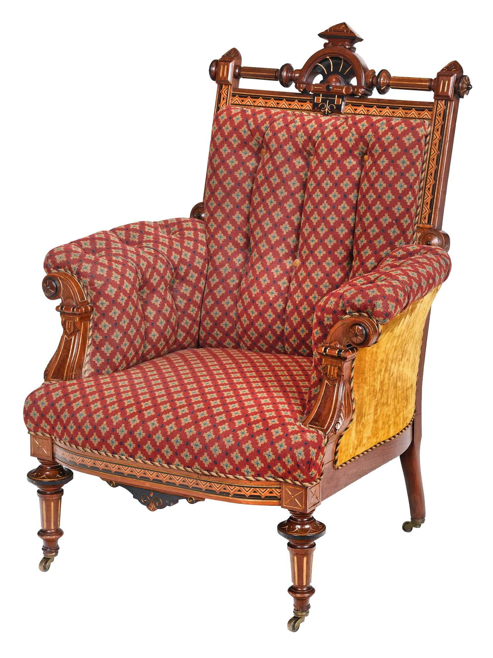 American Aesthetic Movement Walnut Armchair: New York, attributed to Pottier and Stymus, circa 1870, the walnut frame with parquetry inlay and ebonized and gilt highlights, set with tufted upholstery on brass casters, 41-1/4 x 33 x 24 in. Proven