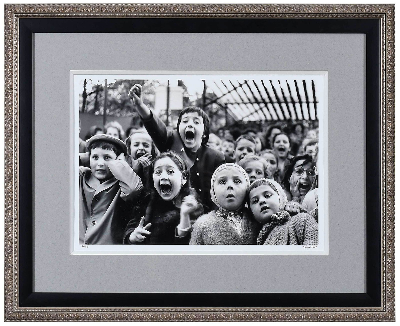 Alfred Eisenstaedt: (German/America, 1898-1995) Children at a Puppet Theater, Paris, 1963, printed later, signed recto lower right "Eisenstadt" and editioned 54/250, inscribed verso in pencil verso with Time Life Photo L
