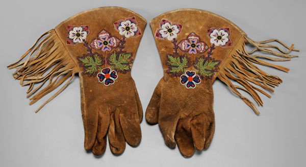Plateau Beaded Gauntlets: American, mid 20th century, fringed hide gloves with flannel-lined cuffs, line and contour-stitched floral beadwork in purple, green and blue, gold and metallic bead highlights, green thread zigzag on