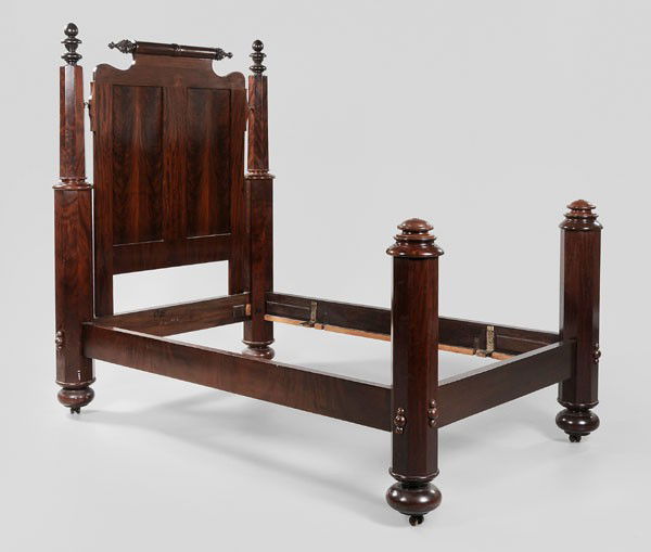 Classical Figured Mahogany Bedstead: American, 19th century, paneled headboard with highly figured veneers and pineapple finials, faceted foot and head posts, 74-1/2 x 55 x 84 in., possibly altered or reconfigured, finials and top of hea