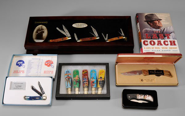 Eleven Celebrity Pocket Knives: 20th century: Paul Bear Bryant, 8-1/4 in., in fitted case, with a biography of Bryant, Alan Barra, [The Last Coach;] John Wayne, in fitted metal case; five famous cowboys, Master Barlows; two-blade Su