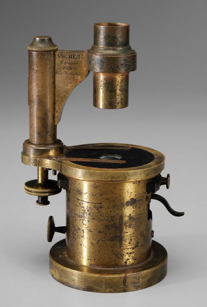 Rare Confederate-Used Nachet: Microscope, French, 1851-1862, hinged mahogany case with interior baffles to hold brass drum-base instrument and fitted trays with eight objects, three eyepieces, an assortment of condensers, glass sl